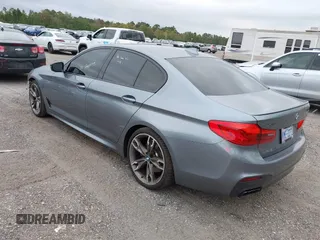 2019 BMW 5 Series M550i xDrive with VIN WBAJB9C57KB289439, listed as a IAAI auction lot 40634389 with 85,992 mi miles and . Bid and sale history available at DreamBid. Image 3.