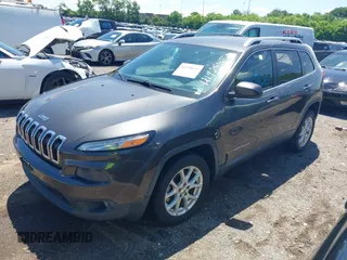 2014 Jeep Cherokee Latitude with VIN 1C4PJLCS0EW297415, listed as a IAAI auction lot 42198645 with 160,268 mi miles. Bid and sale history available at carsss.com. Image 17.
