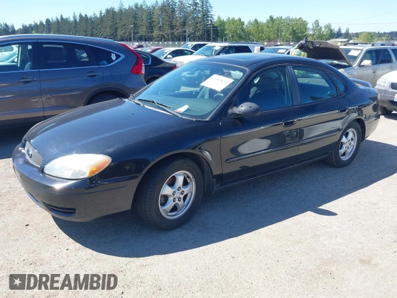 2005 Ford Taurus SE with VIN 1FAFP53255A228082, listed as a IAAI auction lot 42183671 with 95,382 mi miles and . Bid and sale history available at DreamBid. Image 2.