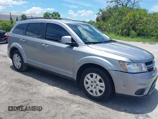 2019 Dodge Journey SE z VIN 3C4PDCBB7KT863841, wystawiony jako IAAI lot #42608998 z przebiegiem 93 326 mil mil oraz . Historia ofert i sprzedaży dostępna na DreamBid. Obrazek 1.