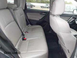 2014 Subaru Forester 2.5i Limited with VIN JF2SJAJC1EH517094, listed as a IAAI auction lot 41953103 with 145,122 mi miles. Bid and sale history available at carsss.com. Image 8.