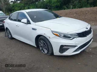 2019 Kia Optima LX with VIN 5XXGT4L36KG357784, listed as a IAAI auction lot 42396618 with 90,939 mi miles and . Bid and sale history available at DreamBid. Image 1.