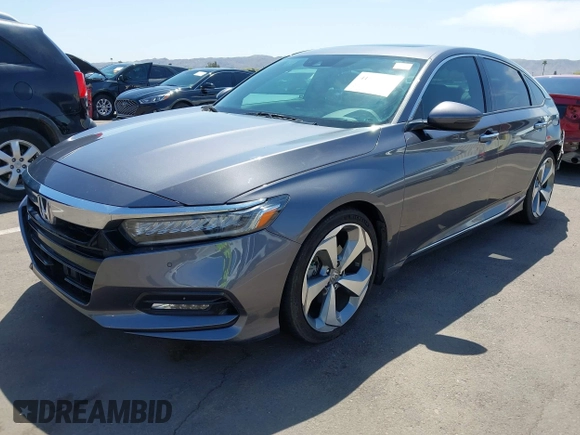 2019 Honda Accord Touring with VIN 1HGCV2F92KA004825, listed as a IAAI auction lot 41974555 with 74,464 mi miles and . Bid and sale history available at DreamBid. Image 2.