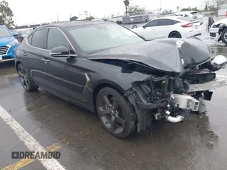 2020 Genesis G70 2.0T z VIN KMTG44LAXLU056055, wystawiony jako IAAI lot #41568738 z przebiegiem 45 602 mil mil oraz . Historia ofert i sprzedaży dostępna na DreamBid. Obrazek 1.