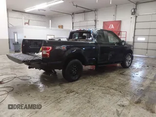 2018 Ford F-150 XL with VIN 1FTEX1EP1JKE74560, listed as a IAAI auction lot 41531539 with 54,558 mi miles and . Bid and sale history available at DreamBid. Image 4.