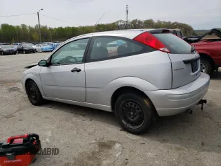 2007 Ford Focus S z VIN 1FAFP31N67W299458, wystawiony jako Copart lot #52703425 z przebiegiem 231 936 mil mil oraz Szkody całkowita. Historia ofert i sprzedaży dostępna na DreamBid. Obrazek 2.