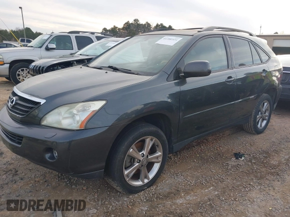 2007 Lexus RX 400h z VIN JTJGW31U372002594, wystawiony jako IAAI lot #41380924 z przebiegiem 243 928 mil mil oraz . Historia ofert i sprzedaży dostępna na DreamBid. Obrazek 2.
