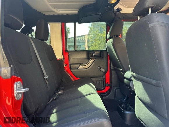 2018 Jeep Wrangler JK Unlimited Sport S with VIN 1C4BJWDG7JL828871, listed as a Copart auction lot 87530425 with 60,958 mi miles and Clean Title. Bid and sale history available at carsss.com. Image 6.