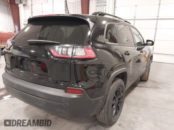 2023 Jeep Cherokee Altitude Lux with VIN 1C4PJMMB8PD109632, listed as a IAAI auction lot 41847907 with 47,219 mi miles. Bid and sale history available at carsss.com. Image 4.