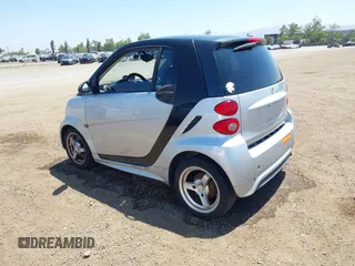 2013 Smart fortwo Pure with VIN WMEEJ3BA8DK619600, listed as a IAAI auction lot 42660006 with Not provided miles and . Bid and sale history available at DreamBid. Image 3.