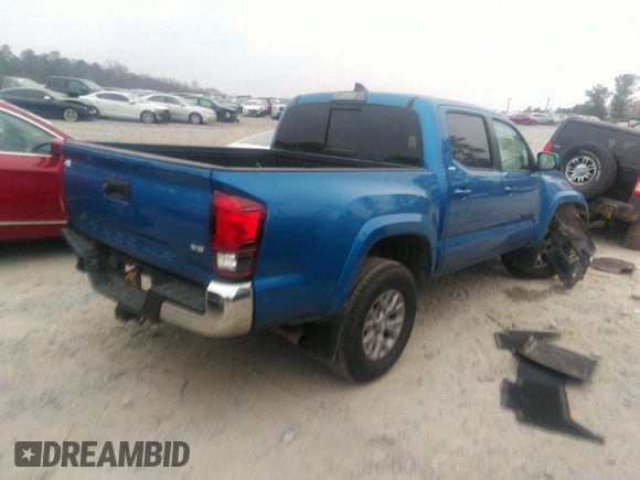 2018 Toyota Tacoma SR5 with VIN 3TMAZ5CN3JM066409, listed as a IAAI auction lot 41204775 with 75,000 mi miles and . Bid and sale history available at DreamBid. Image 4.