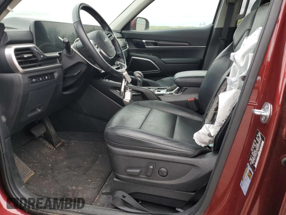 2023 Kia Telluride S z VIN 5XYP6DGC9PG392131, wystawiony jako Copart lot #57106315 z przebiegiem 9 888 mil mil oraz Szkoda całkowita • Salvage title. Historia ofert i sprzedaży dostępna na DreamBid. Obrazek 7.