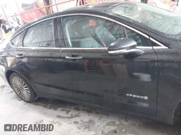 2013 Ford Fusion Titanium Hybrid with VIN 3FA6P0RU4DR281789, listed as a IAAI auction lot 41909115 with 161,008 mi miles and . Bid and sale history available at DreamBid. Image 14.