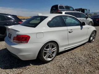 2012 BMW 1 Series 135i with VIN WBAUC9C52CVM12915, listed as a Copart auction lot 67145834 with 114,306 mi miles and Salvage title. Bid and sale history available at DreamBid. Image 3.