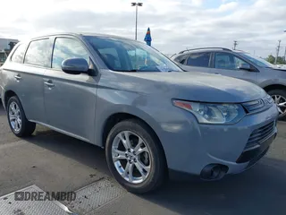 2014 Mitsubishi Outlander SE z VIN JA4AD3A37EZ011335, wystawiony jako IAAI lot #42115343 z przebiegiem 129 159 mil mil oraz . Historia ofert i sprzedaży dostępna na DreamBid. Obrazek 1.