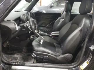 2007 MINI Hardtop S with VIN WMWMF73547TL90560, listed as a Copart auction lot 42565685 with 57,066 mi miles and Salvage Title. Bid and sale history available at DreamBid. Image 7.