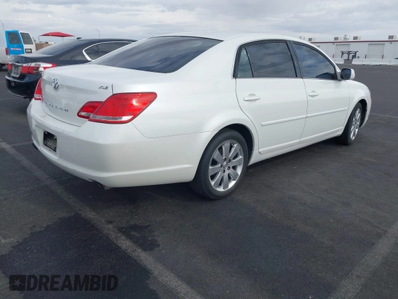 2007 Toyota Avalon XL with VIN 4T1BK36B97U252227, listed as a IAAI auction lot 42067958 with 245,781 mi miles. Bid and sale history available at carsss.com. Image 4.