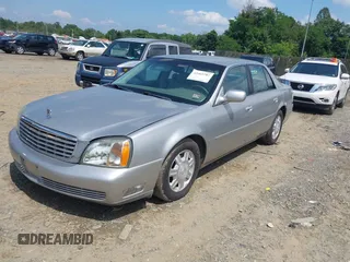 2005 Cadillac DeVille z VIN 1G6KD54Y15U158635, wystawiony jako IAAI lot #42469707 z przebiegiem 136 336 mil mil oraz . Historia ofert i sprzedaży dostępna na DreamBid. Obrazek 2.