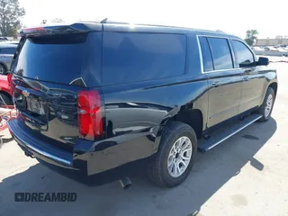 2019 Chevrolet Suburban LT with VIN 1GNSCJKCXKR332739, listed as a IAAI auction lot 41636530 with 104,997 mi miles and . Bid and sale history available at DreamBid. Image 4.