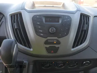 2016 Ford Transit Cargo z VIN 1FTYE1YM3GKB18575, wystawiony jako IAAI lot #42734024 z przebiegiem 186 138 mil mil oraz . Historia ofert i sprzedaży dostępna na DreamBid. Obrazek 21.