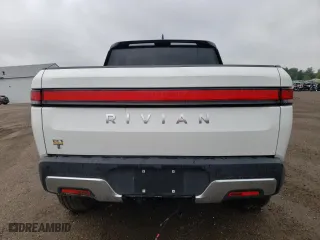 2022 Rivian R1T Adventure Package with VIN 7FCTGAAA8NN012505, listed as a Copart auction lot 72496734 with 5,916 mi miles and Salvage Title. Bid and sale history available at carsss.com. Image 6.