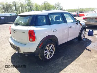 2013 MINI Countryman with VIN WMWZB3C56DWR36117, listed as a IAAI auction lot 42076676 with 168,750 mi miles and . Bid and sale history available at DreamBid. Image 4.