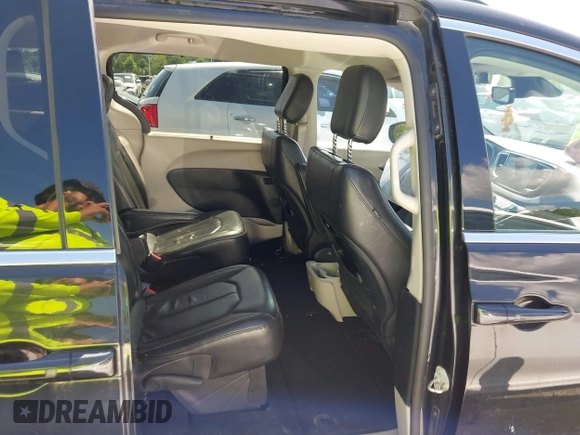 2022 Chrysler Pacifica Touring L with VIN 2C4RC1BG3NR106311, listed as a IAAI auction lot 42158651 with 68,473 mi miles and . Bid and sale history available at DreamBid. Image 8.