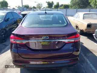2017 Ford Fusion SE z VIN 3FA6P0H78HR368483, wystawiony jako IAAI lot #42279314 z przebiegiem 68 363 mil mil oraz . Historia ofert i sprzedaży dostępna na DreamBid. Obrazek 16.
