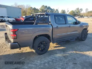 2023 Nissan Frontier SV z VIN 1N6ED1EK7PN672948, wystawiony jako Copart lot #45247705 z przebiegiem 13 031 mil mil oraz Szkoda całkowita • Salvage title. Historia ofert i sprzedaży dostępna na DreamBid. Obrazek 3.