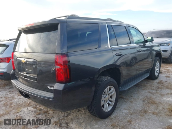 2017 Chevrolet Tahoe LT with VIN 1GNSKBKC3HR206093, listed as a IAAI auction lot 40602629 with 161,740 mi miles and . Bid and sale history available at DreamBid. Image 4.