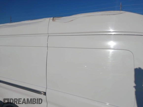 2023 Ford Transit Cargo with VIN 1FTBR3U86PKA39951, listed as a IAAI auction lot 41449397 with 46,883 mi miles and . Bid and sale history available at DreamBid. Image 6.
