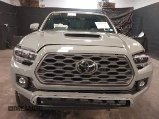 2023 Toyota Tacoma 4WD SR with VIN 3TMCZ5ANXPM607489, listed as a IAAI auction lot 41605018 with 15,229 mi miles. Bid and sale history available at carsss.com. Image 12.