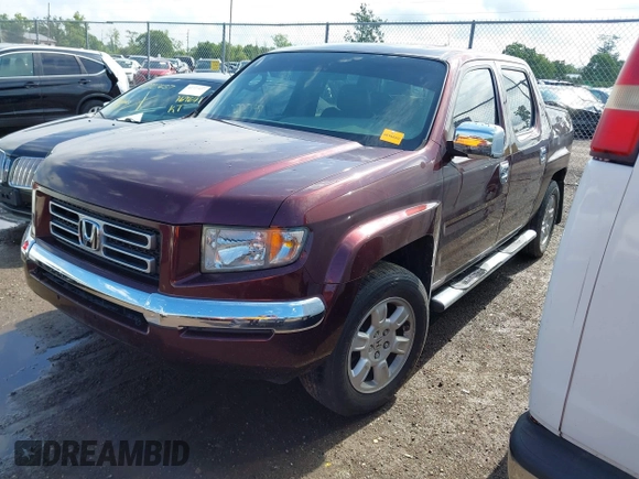 2007 Honda Ridgeline RTL with VIN 2HJYK16587H518901, listed as a IAAI auction lot 42762425 with 206,243 mi miles and . Bid and sale history available at DreamBid. Image 2.