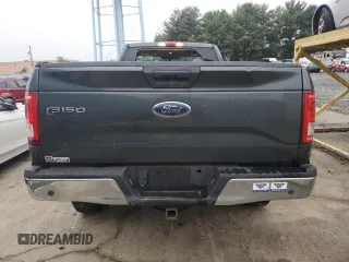 2015 Ford F-150 XL with VIN 1FTNF1EG1FKD00398, listed as a Copart auction lot 72774054 with 164,052 mi miles and Salvage title. Bid and sale history available at DreamBid. Image 6.
