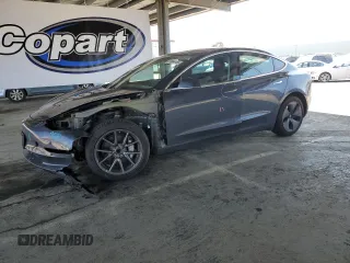 2018 Tesla Model 3 Long Range Battery with VIN 5YJ3E1EA2JF157683, listed as a Copart auction lot 53864165 with 72,736 mi miles and Salvage Title. Bid and sale history available at carsss.com. Image 1.