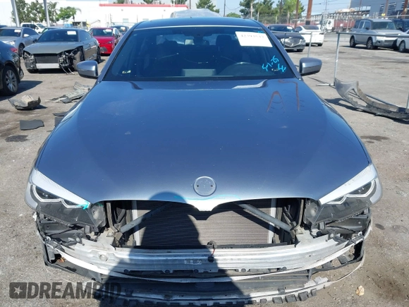 2017 BMW 5 Series 530i with VIN WBAJA5C34HG897019, listed as a IAAI auction lot 42393537 with 94,578 mi miles and . Bid and sale history available at DreamBid. Image 6.