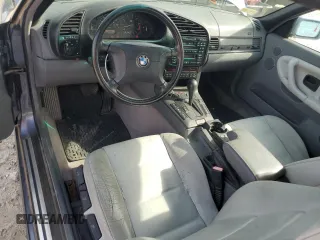 1999 BMW 3 Series 323i z VIN WBABJ8339XEM25396, wystawiony jako Copart lot #58027715 z przebiegiem 145 503 mil mil oraz Czysty tytuł • Clean title. Historia ofert i sprzedaży dostępna na DreamBid. Obrazek 8.