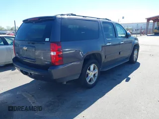 2011 Chevrolet Suburban LT with VIN 1GNSCJE03BR255374, listed as a IAAI auction lot 41826513 with 279,698 mi miles. Bid and sale history available at carsss.com. Image 4.
