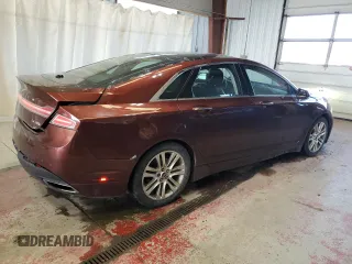 2015 Lincoln MKZ z VIN 3LN6L2J96FR600052, wystawiony jako Copart lot #56194715 z przebiegiem 259 911 mil mil oraz Szkoda całkowita • Salvage title. Historia ofert i sprzedaży dostępna na DreamBid. Obrazek 3.