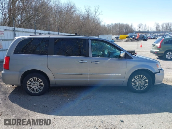 2013 Chrysler Town & Country Touring L with VIN 2C4RC1CG6DR660858, listed as a IAAI auction lot 41970976 with 140,299 mi miles and . Bid and sale history available at DreamBid. Image 13.