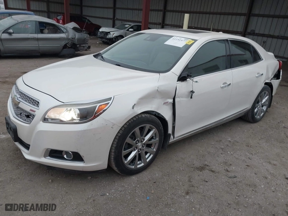 2013 Chevrolet Malibu LTZ with VIN 1G11H5SA7DF127467, listed as a IAAI auction lot 41192477 with 138,344 mi miles. Bid and sale history available at carsss.com. Image 2.