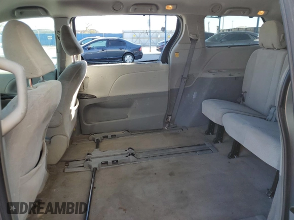 2012 Toyota Sienna LE AAS with VIN 5TDKK3DC8CS259085, listed as a Copart auction lot 73592584 with 198,370 mi miles and Salvage Title. Bid and sale history available at DreamBid. Image 11.