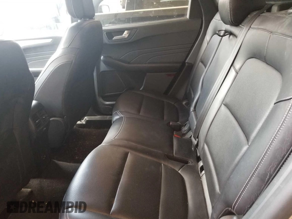 2021 Ford Escape SEL Hybrid with VIN 1FMCU0CZXMUB25464, listed as a IAAI auction lot 42616757 with 96,059 mi miles and . Bid and sale history available at DreamBid. Image 8.