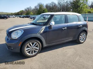 2013 MINI Countryman S with VIN WMWZC3C56DWP23892, listed as a Copart auction lot 58837985 with 98,988 mi miles and Clean title. Bid and sale history available at DreamBid. Image 1.
