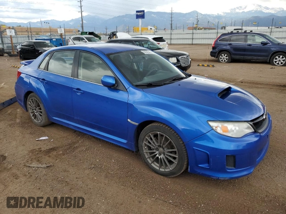 2012 Subaru WRX WRX with VIN JF1GV7E6XCG023762, listed as a Copart auction lot 56332545 with 127,263 mi miles and Salvage title. Bid and sale history available at DreamBid. Image 4.