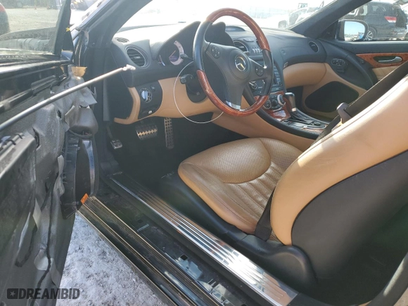 2009 Mercedes-Benz SL-Class V8 with VIN WDBSK71F09F144591, listed as a Copart auction lot 46873785 with 63,977 mi miles and Salvage Title. Bid and sale history available at carsss.com. Image 8.