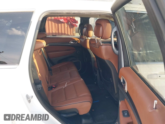 2016 Jeep Grand Cherokee Summit with VIN 1C4RJFJG3GC318626, listed as a IAAI auction lot 40737019 with 92,880 mi miles and . Bid and sale history available at DreamBid. Image 8.