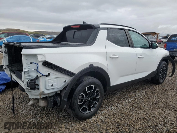 2023 Hyundai Santa Cruz SEL Premium z VIN 5NTJDDAF7PH059404, wystawiony jako Copart lot #55059665 z przebiegiem 13 463 mil mil oraz Szkoda całkowita • Salvage title. Historia ofert i sprzedaży dostępna na DreamBid. Obrazek 3.