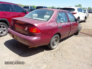1998 Toyota Corolla VE with VIN 1NXBR12EXWZ011906, listed as a IAAI auction lot 42028529 with Not provided miles and . Bid and sale history available at DreamBid. Image 4.