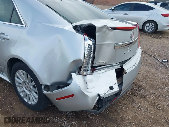 2013 Cadillac CTS Luxury with VIN 1G6DH5E58D0102036, listed as a IAAI auction lot 42270393 with 133,203 mi miles and . Bid and sale history available at DreamBid. Image 6.